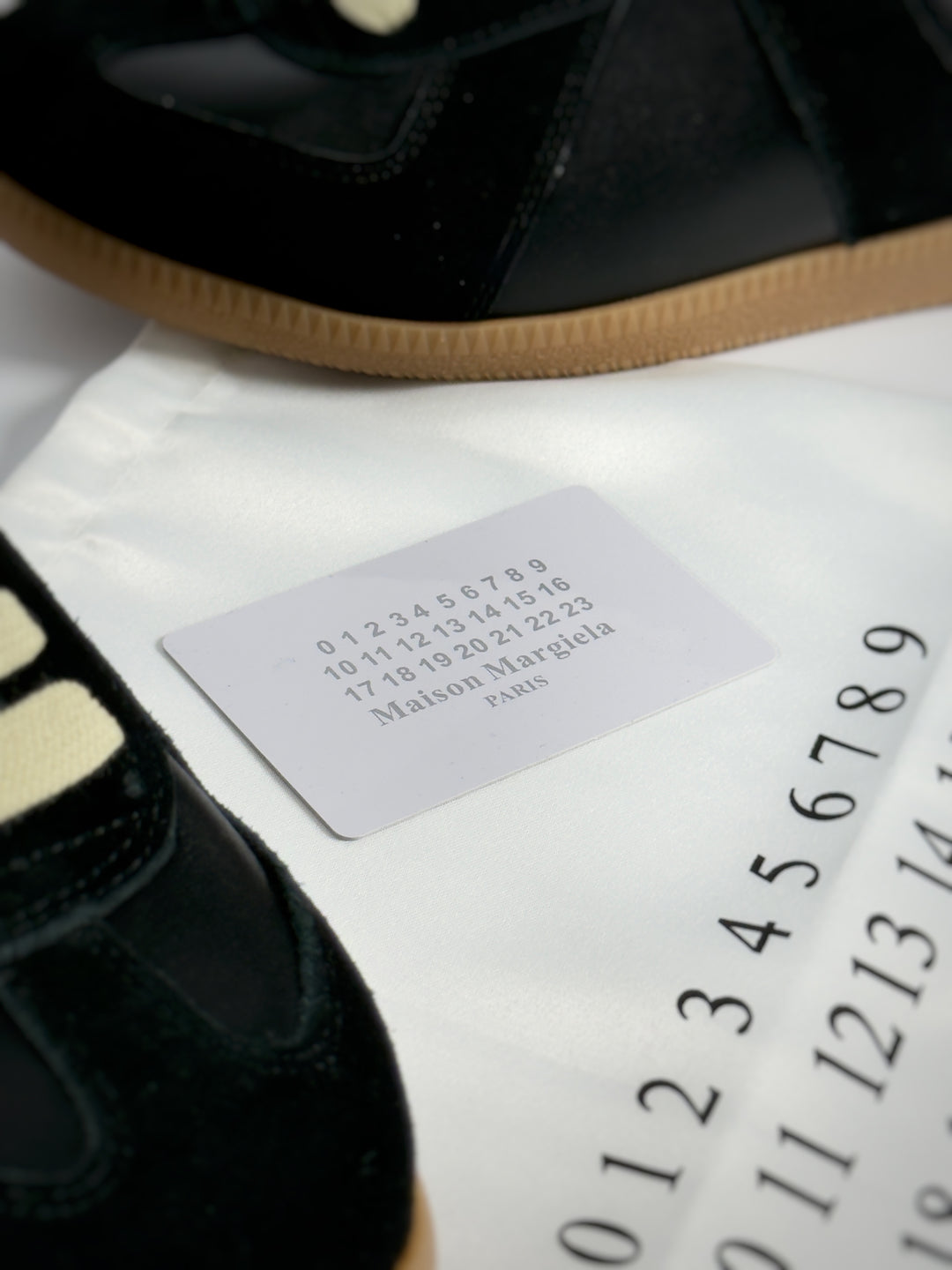 Maison Margiela Men's Replica Mid-Top
Sneakers